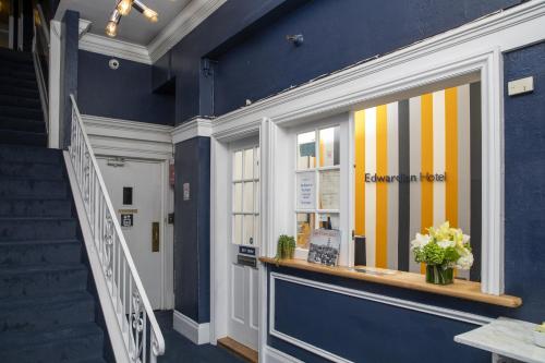a store front with a window with colorful stripes at Edwardian Hotel in San Francisco